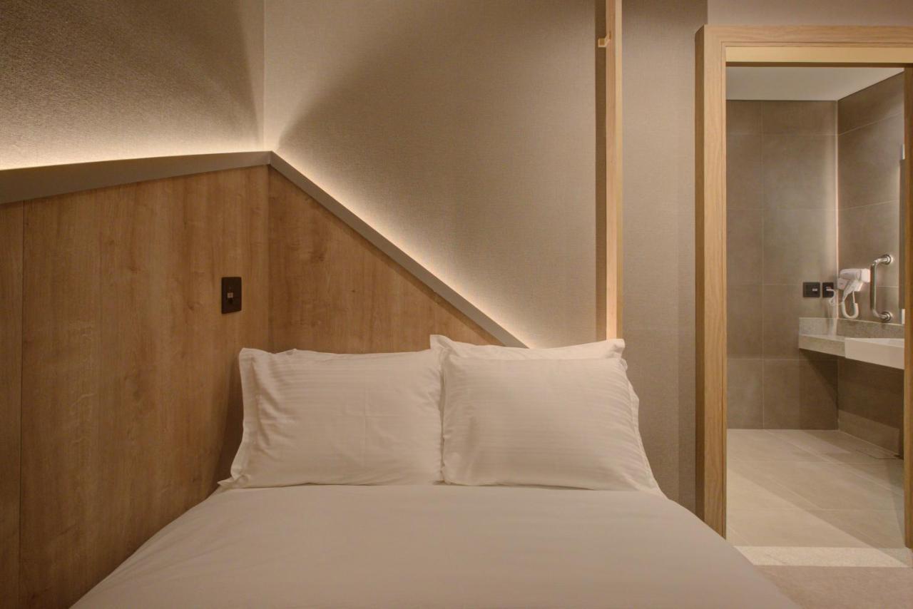 Fast Sleep Suites By Slaviero Hoteis - Hotel Dentro Do Aeroporto De Guarulhos - Terminal 2 - Desembarque Oeste Extérieur photo